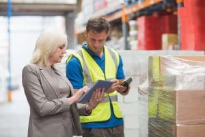 Warehouse Managers and Supervisors reviewing layout of the Warehouse