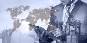 Supply Chain Manager holding tablet, managing Logistics Operations