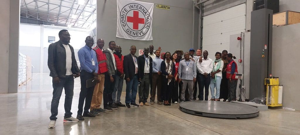 A photograph taken from one of our visits to the ICRC Regional Logistics Center in Nairobi, Kenya, featuring students of our HELM training sessions.